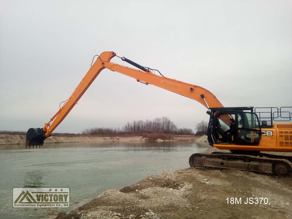JS370 excavator with 18m long reach boom